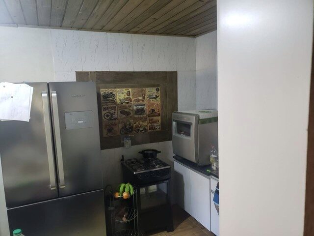 Imagem: A casa possui 3 Dormitórios, 3 Banheiros, 2 Vagas na