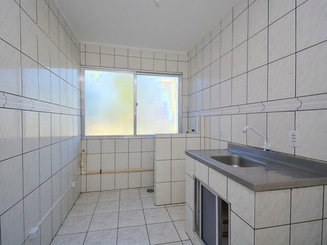 Imagem: O apartamento possui 3 Dormitórios, 1 Banheiro, 68m² de