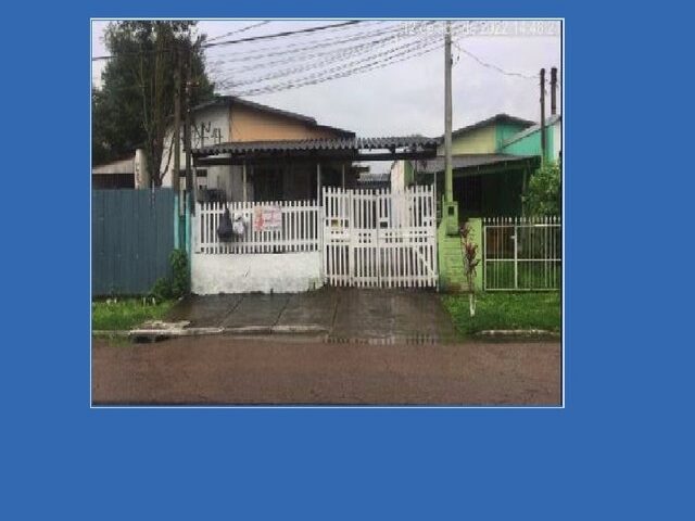 Imagem: A casa possui 2 Dormitórios, 1 Banheiro, 1 Vaga na
