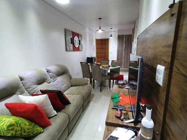 Imagem: O apartamento possui 2 Dormitórios, 1 Suíte, 2 Banheiros,