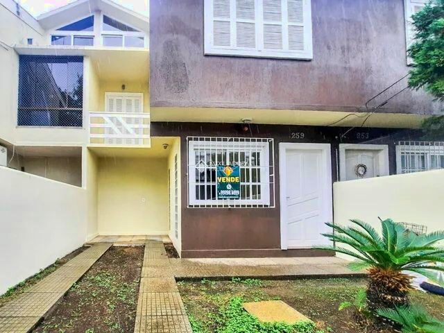 Imagem: A casa possui 3 Dormitórios, 1 Banheiro, 1 Vaga na
