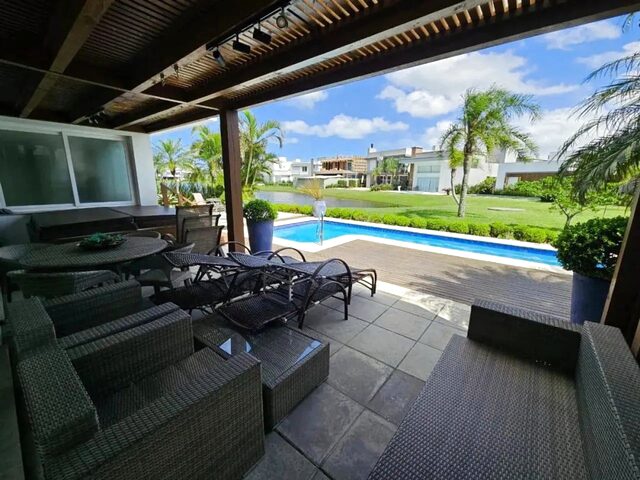 Imagem 2: Casa Mobiliada com 04Suítes e Piscina À Venda - Condomínio Enseada Lagos Xangri-Lá
