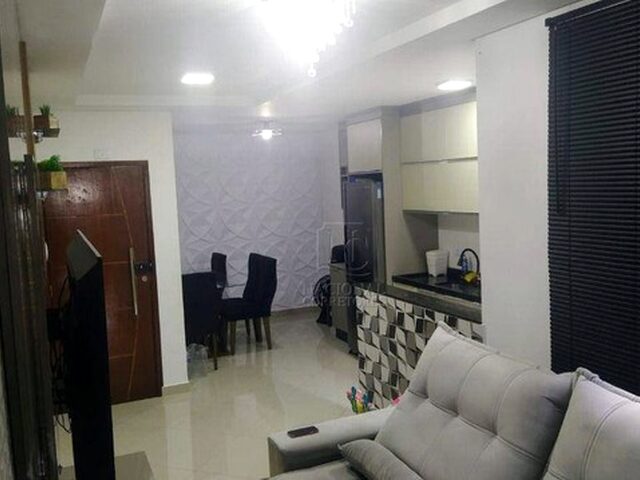 Imagem: O apartamento possui 2 Dormitórios, 1 Suíte, 2 Banheiros,
