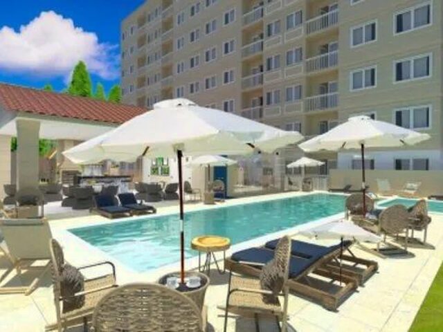 Imagem: O apartamento possui 2 Dormitórios, 1 Suíte, 2 Banheiros,